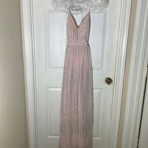 NWT- formal gown. Size 9 (but runs a little small)